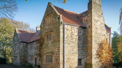 Exterior of the hall in autumn at Washington Old Hall, Tyne & Wear